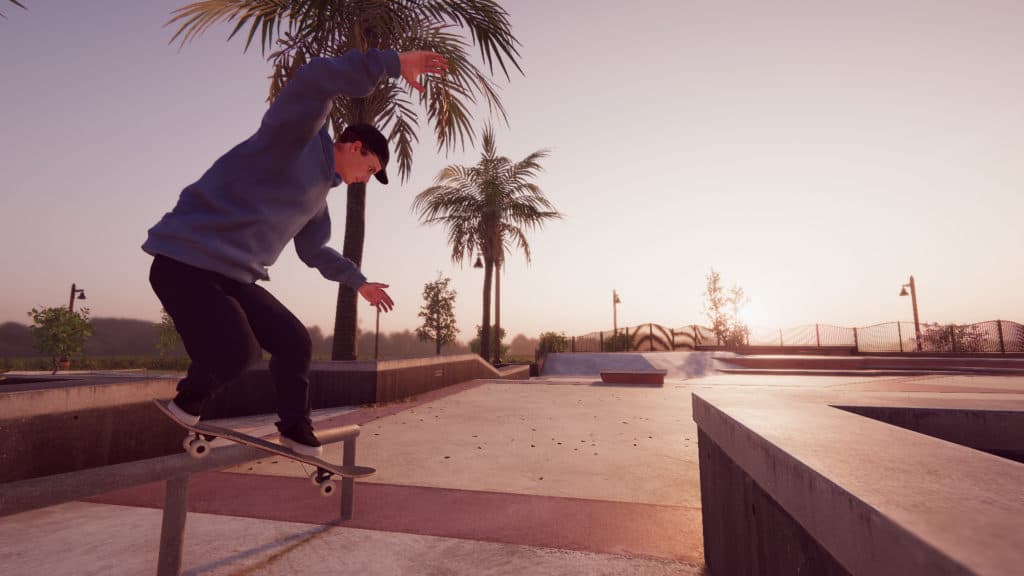 Un skateur faisant un smith grind dans Skater XL