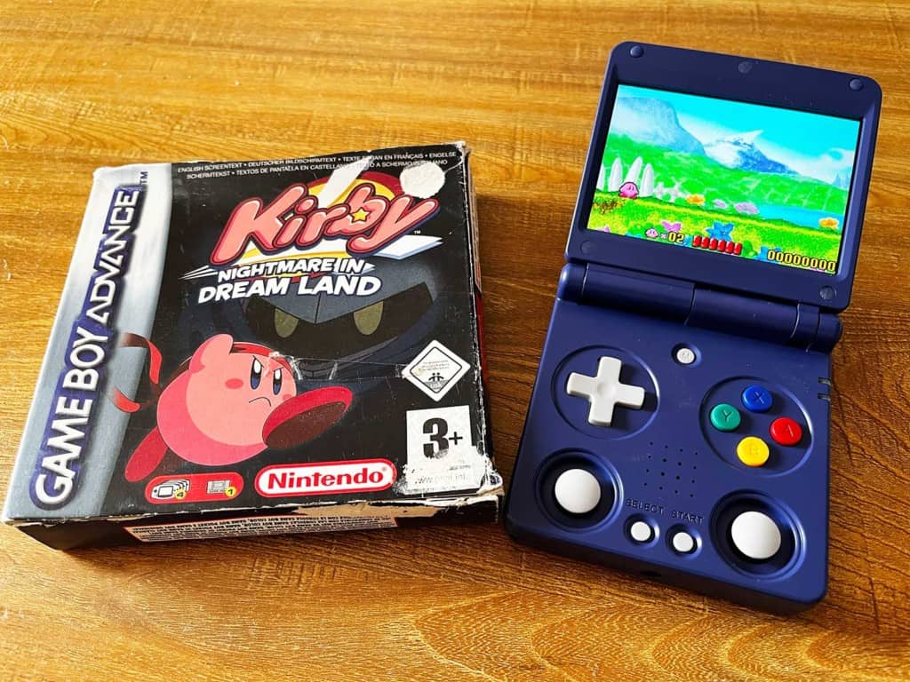 La console Anbernic RG34XXSP et une jeu GBA