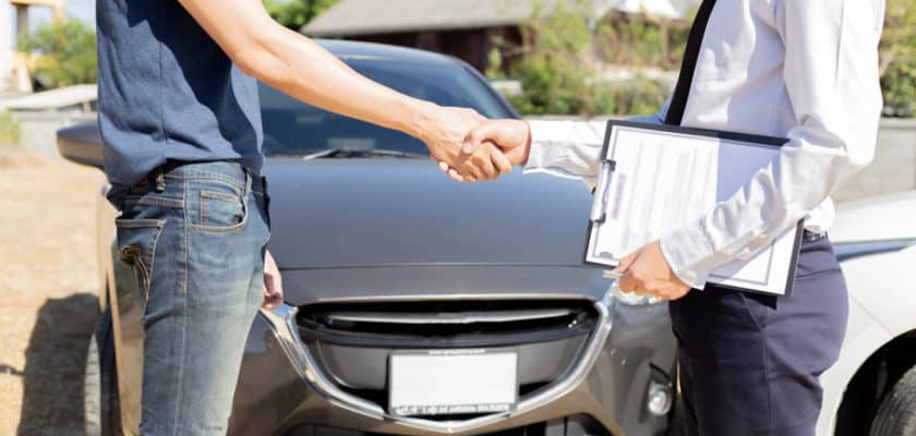 A picture containing person, outdoor, car, trouser Description automatically generated