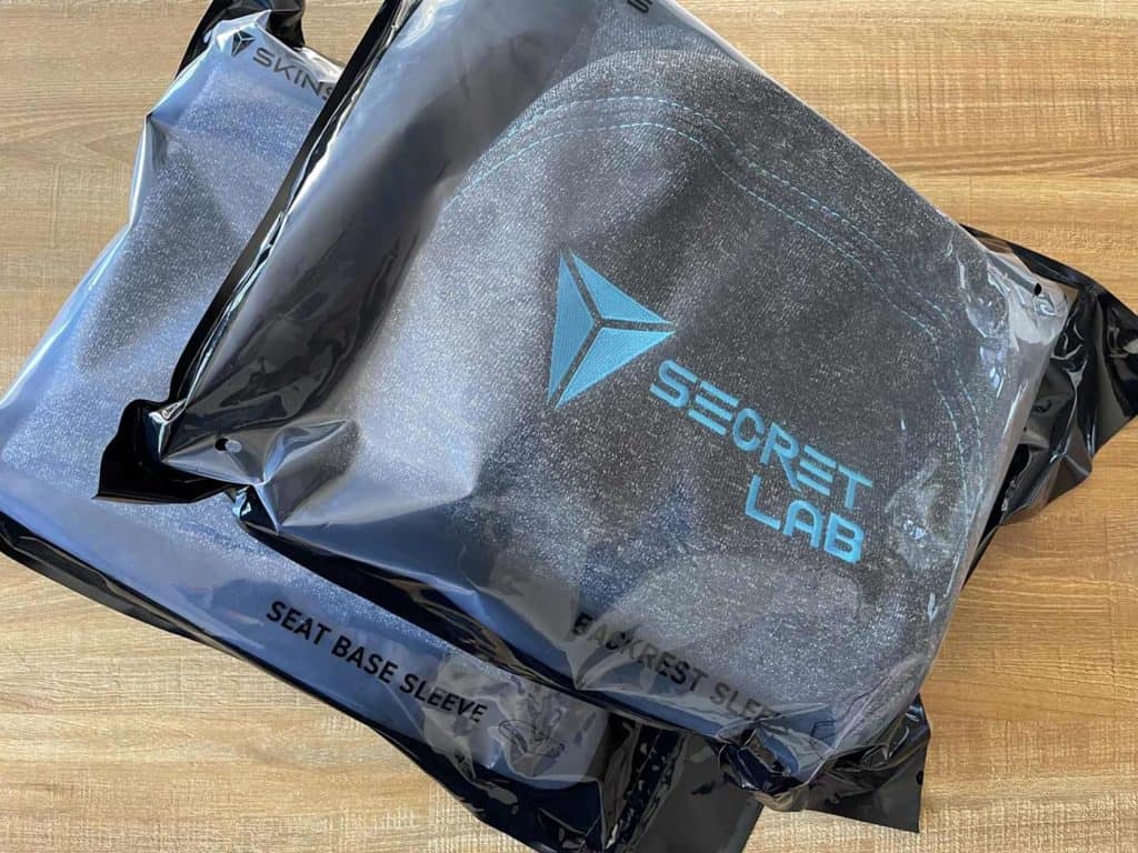 Les housses Secretlab SKINS dans leur emballage